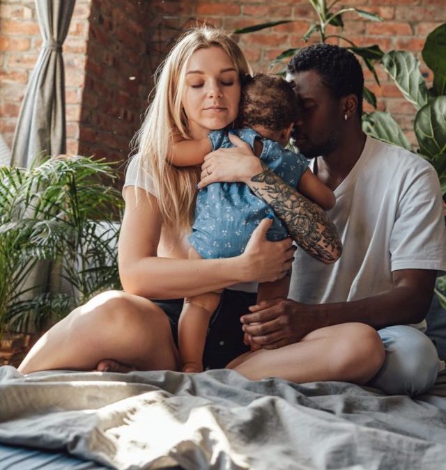 cropped-multi-ethnic-couple-and-their-baby-having-fun-at-h-2021-09-04-15-16-36-utc-scaled-1.jpg