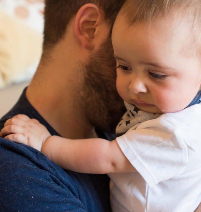 cropped-father-comforting-crying-baby-2021-09-02-10-31-15-utc.jpg