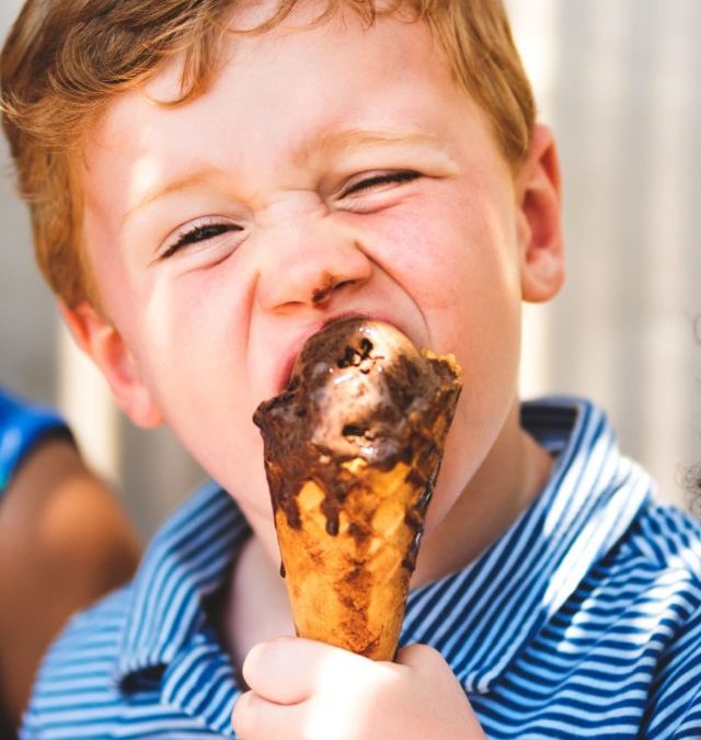 cropped-little-boy-enjoying-an-ice-cream-2021-10-20-18-38-51-utc_reduce.jpg