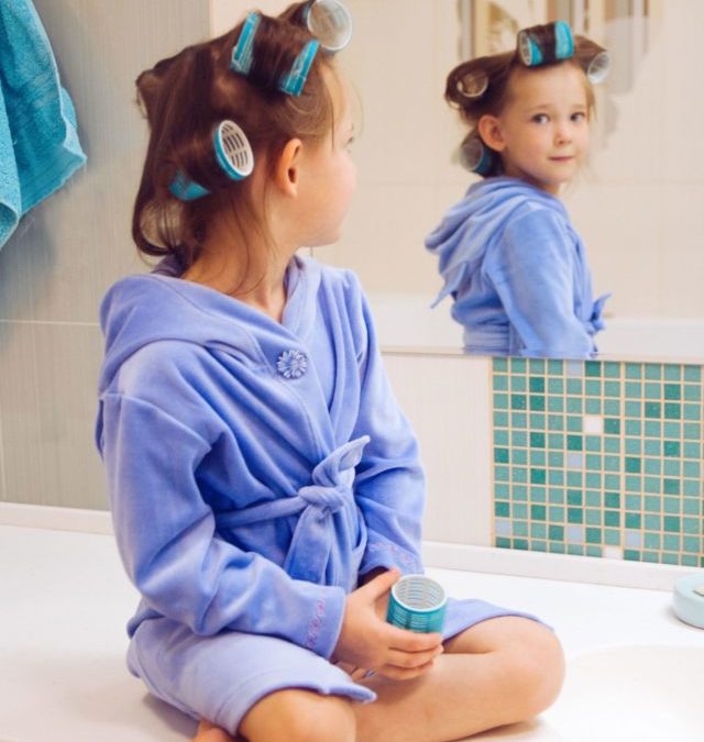cropped-the-girl-in-the-bathroom-in-a-blue-robe-and-curler-2021-08-29-08-45-24-utc.jpg