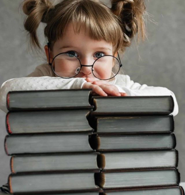 baby-girl-reads-books-school-textbooks-pupil-2022-03-03-14-16-06-utc