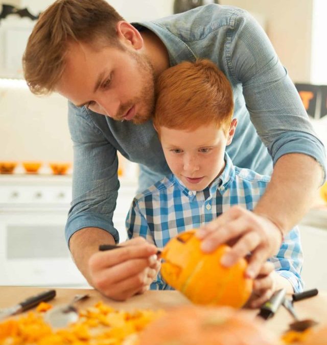 father-and-son-preparing-pumpkin-2021-08-27-23-18-25-utc